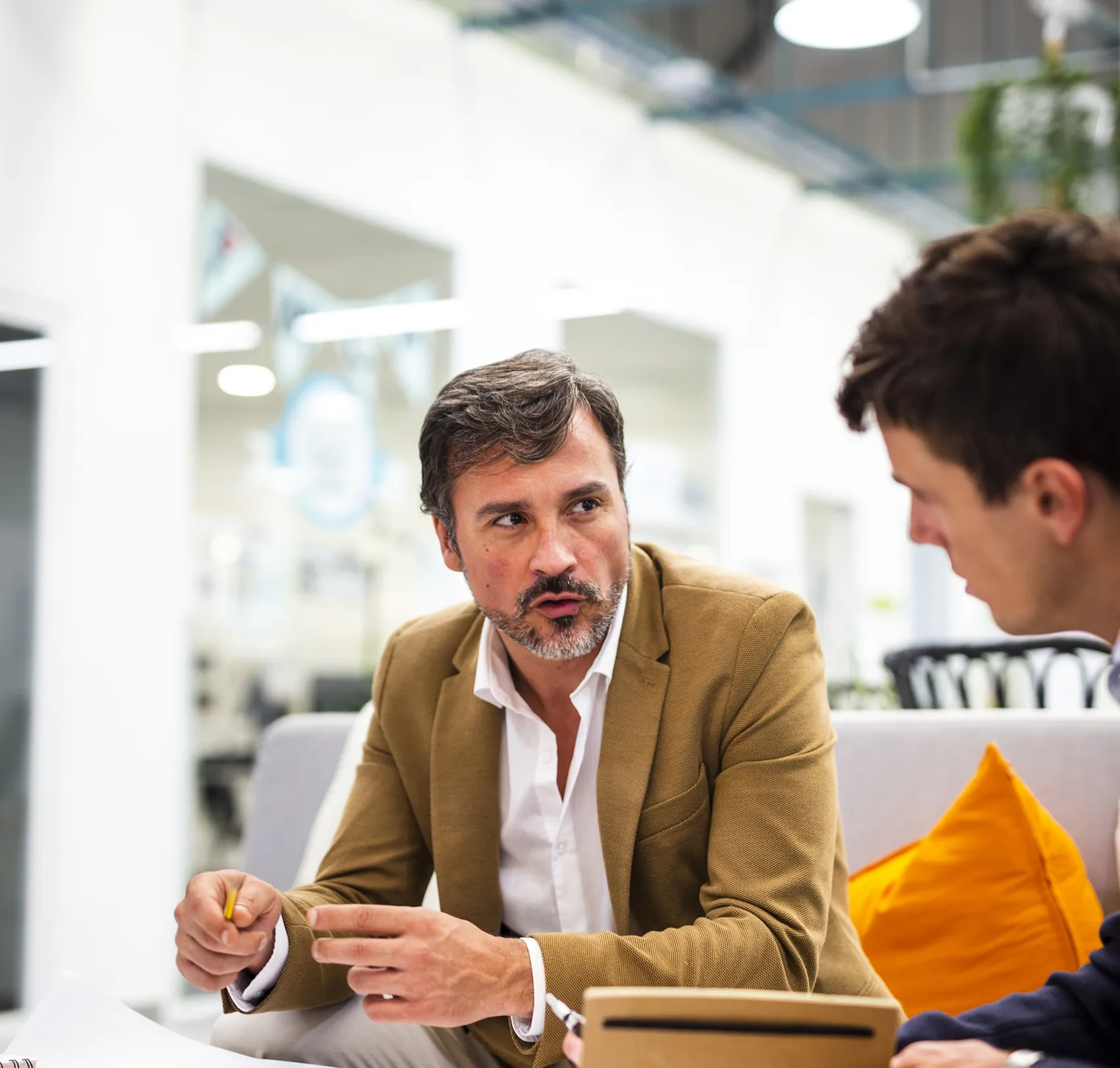 An adviser and client discussing a well-prepared retirement